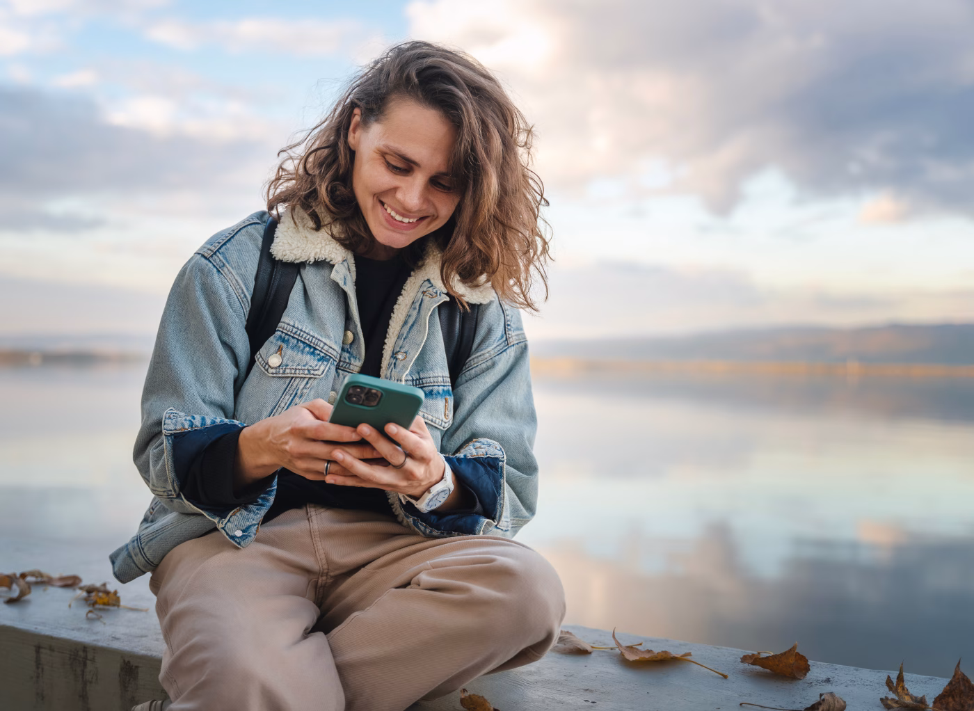 A woman checks her credit payment history with Community Choice Credit Union