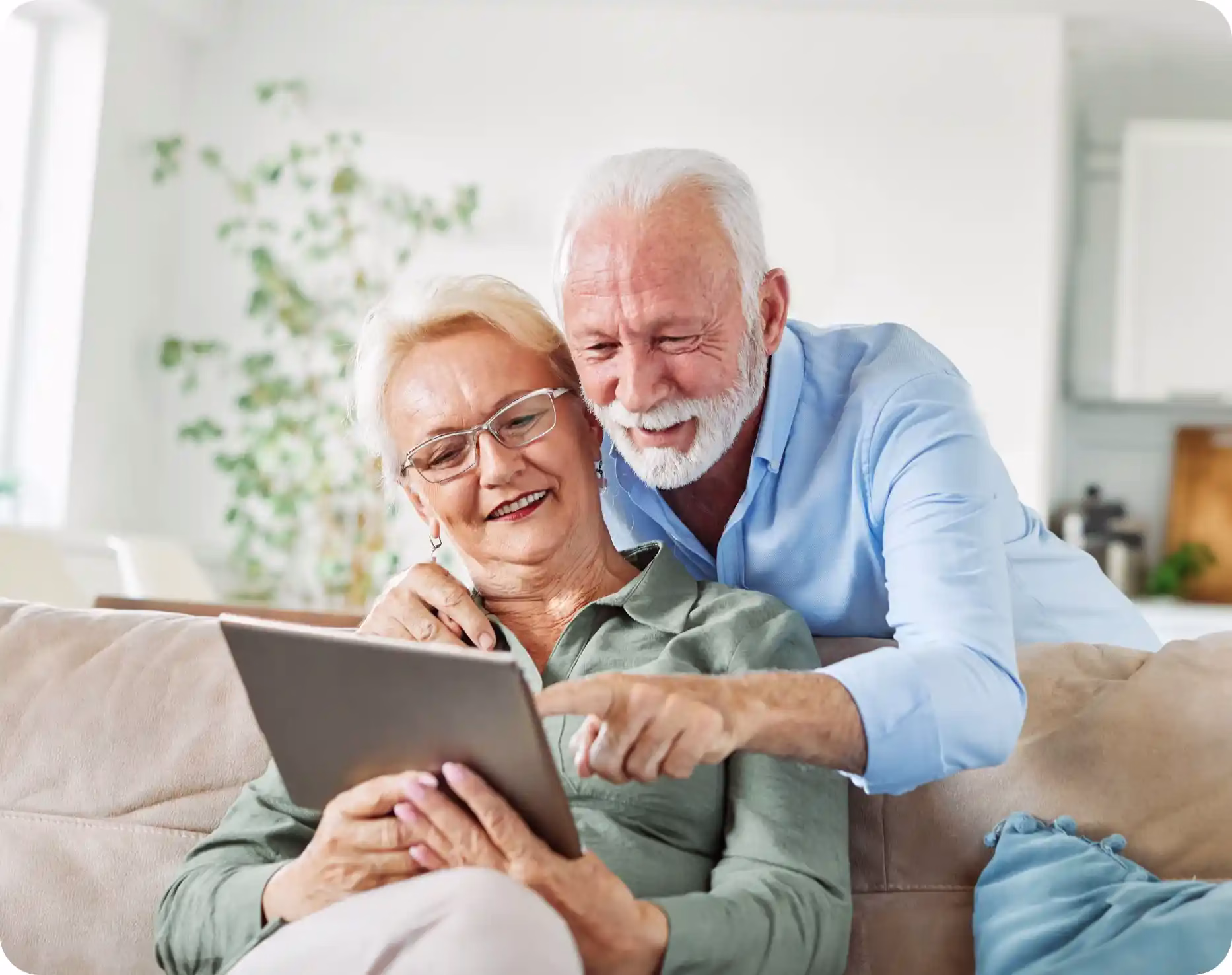 A man and wife looking at Community Choice's treasury management services