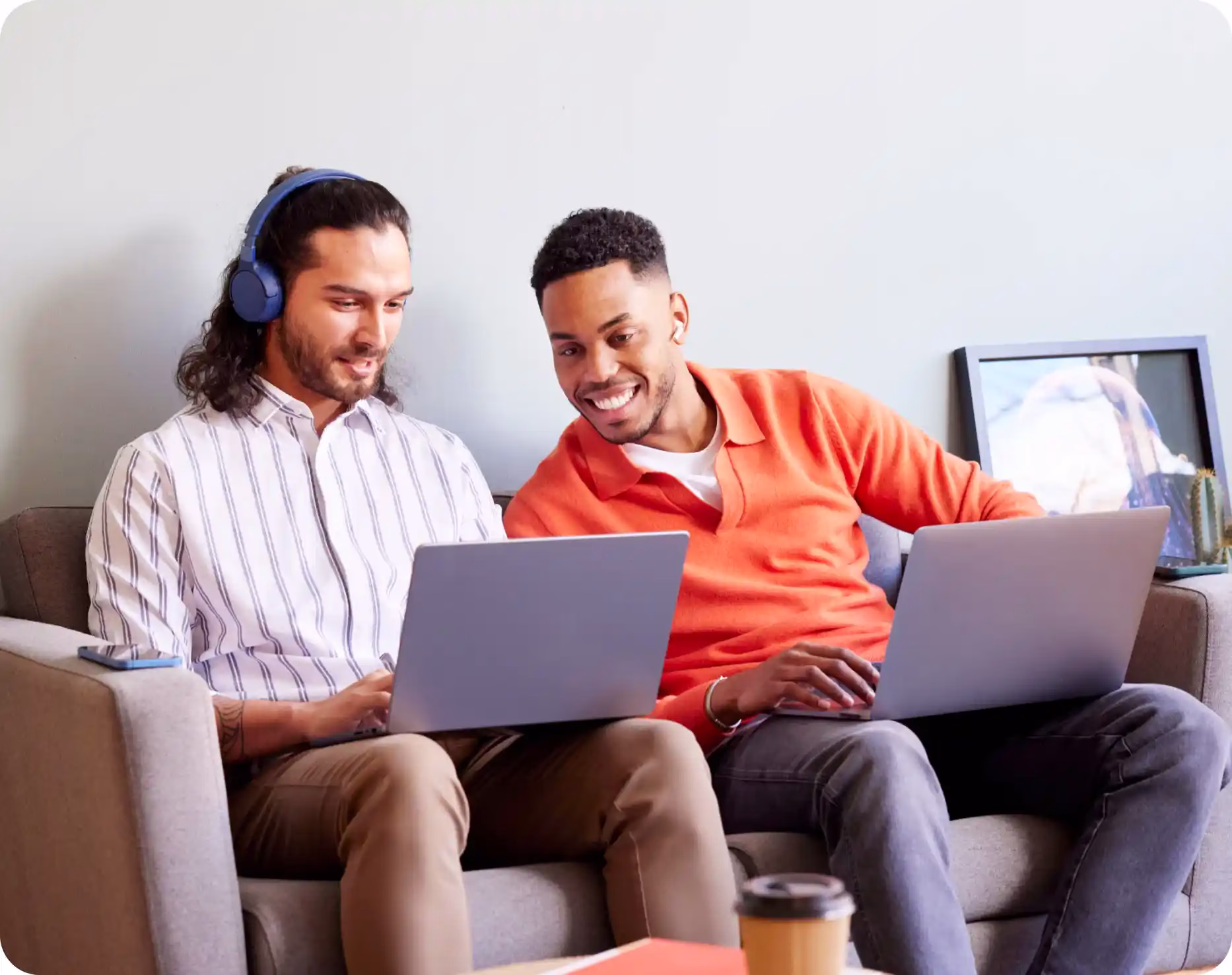 Two people sitting discussing Community Choice rewards