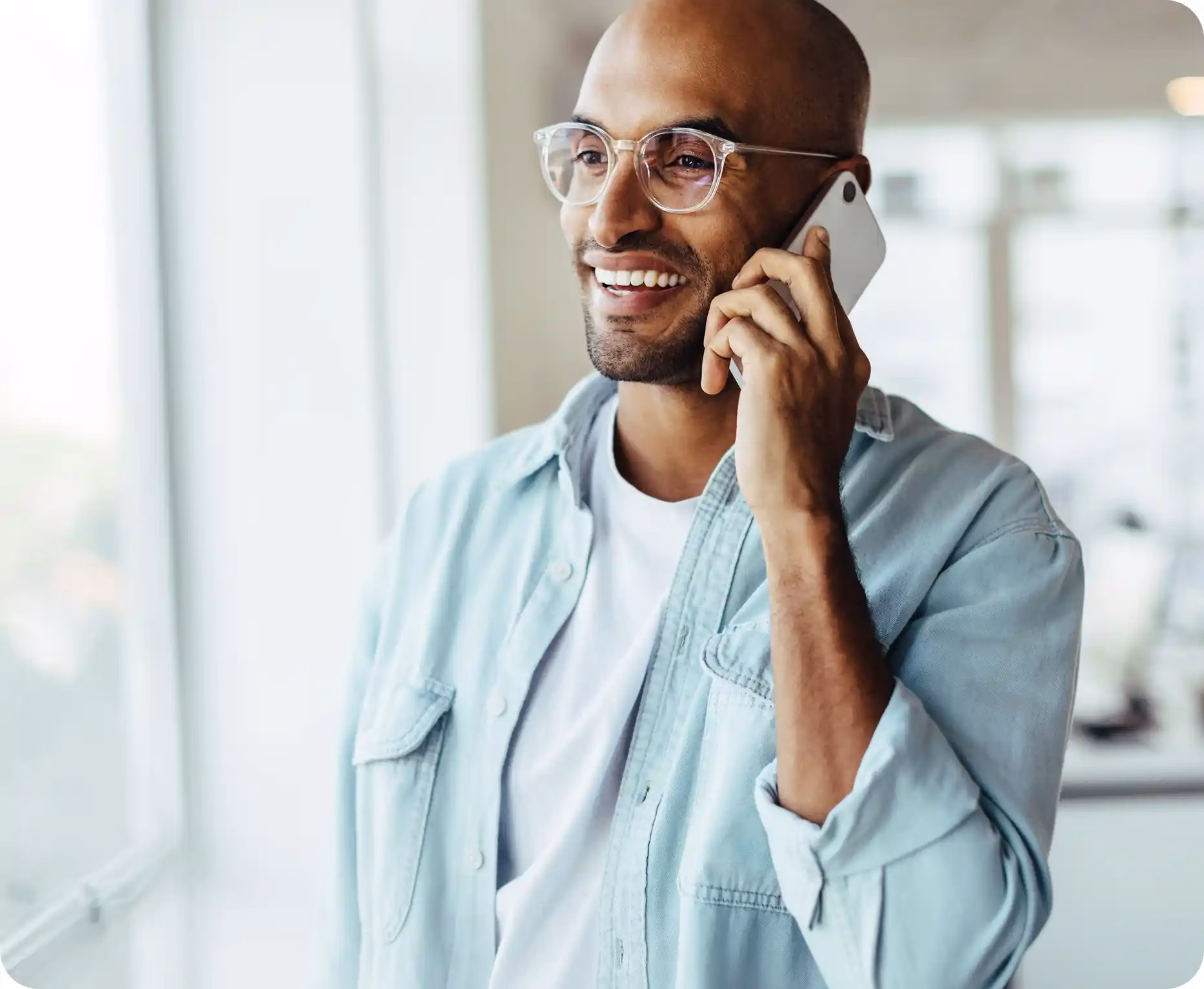A man on his phone discussing Community Choice Credit Union's business lines of credit