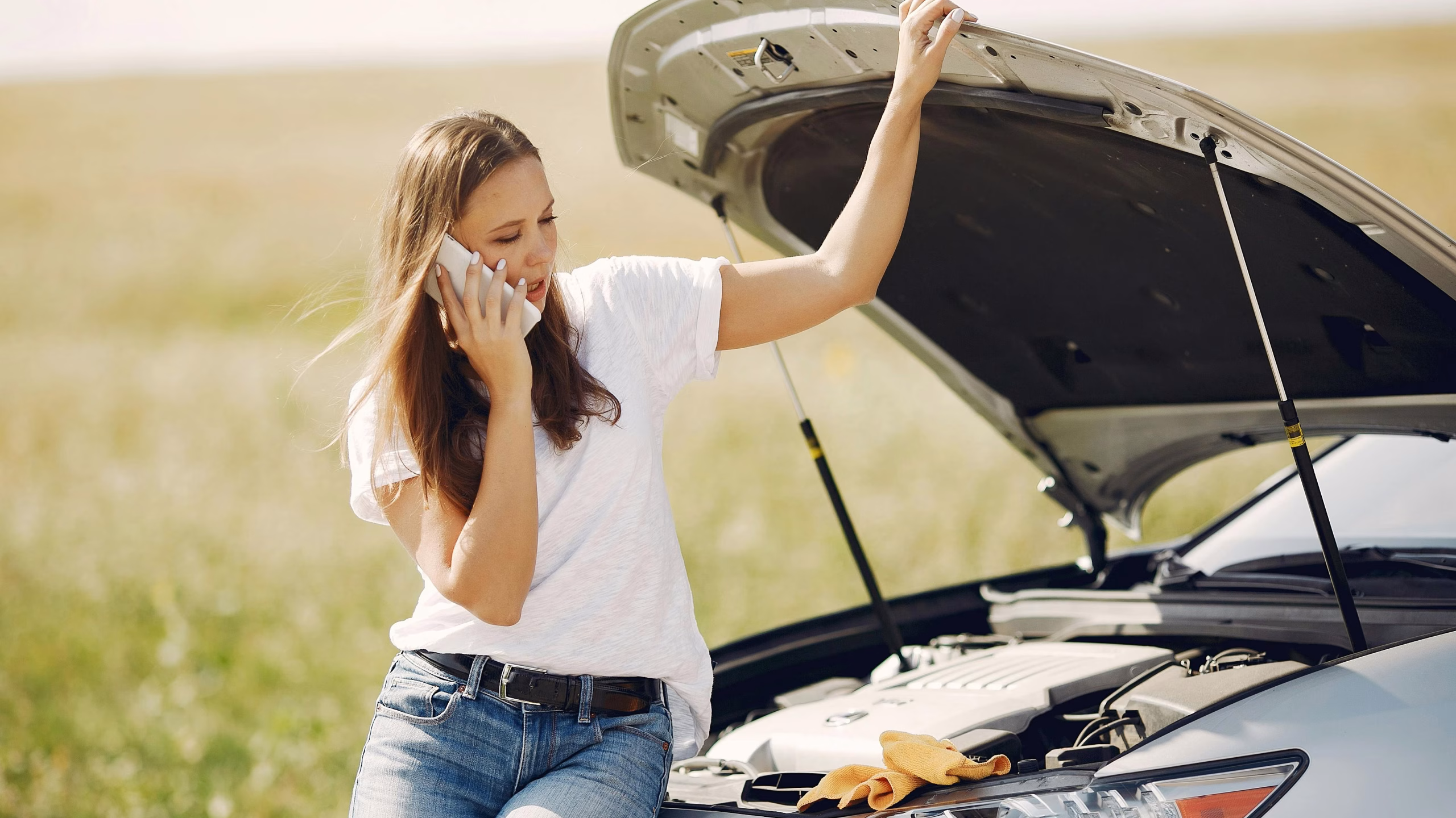 Young woman's car breaks down