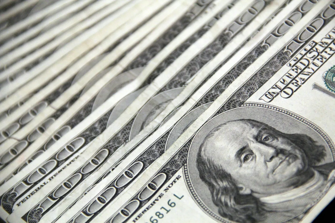 $100 bills fanned out.