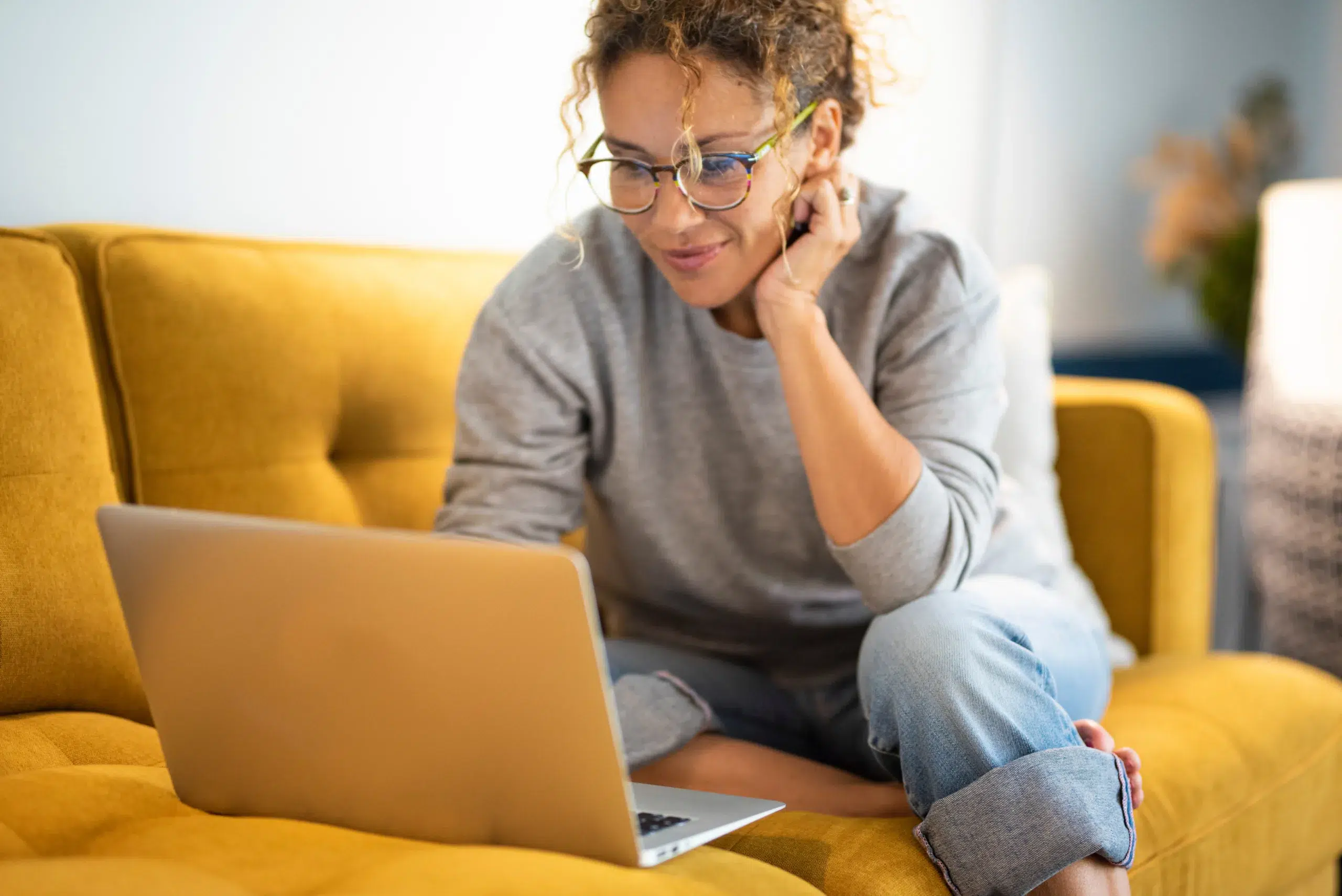A woman manages her credit with Community Choice Credit Union