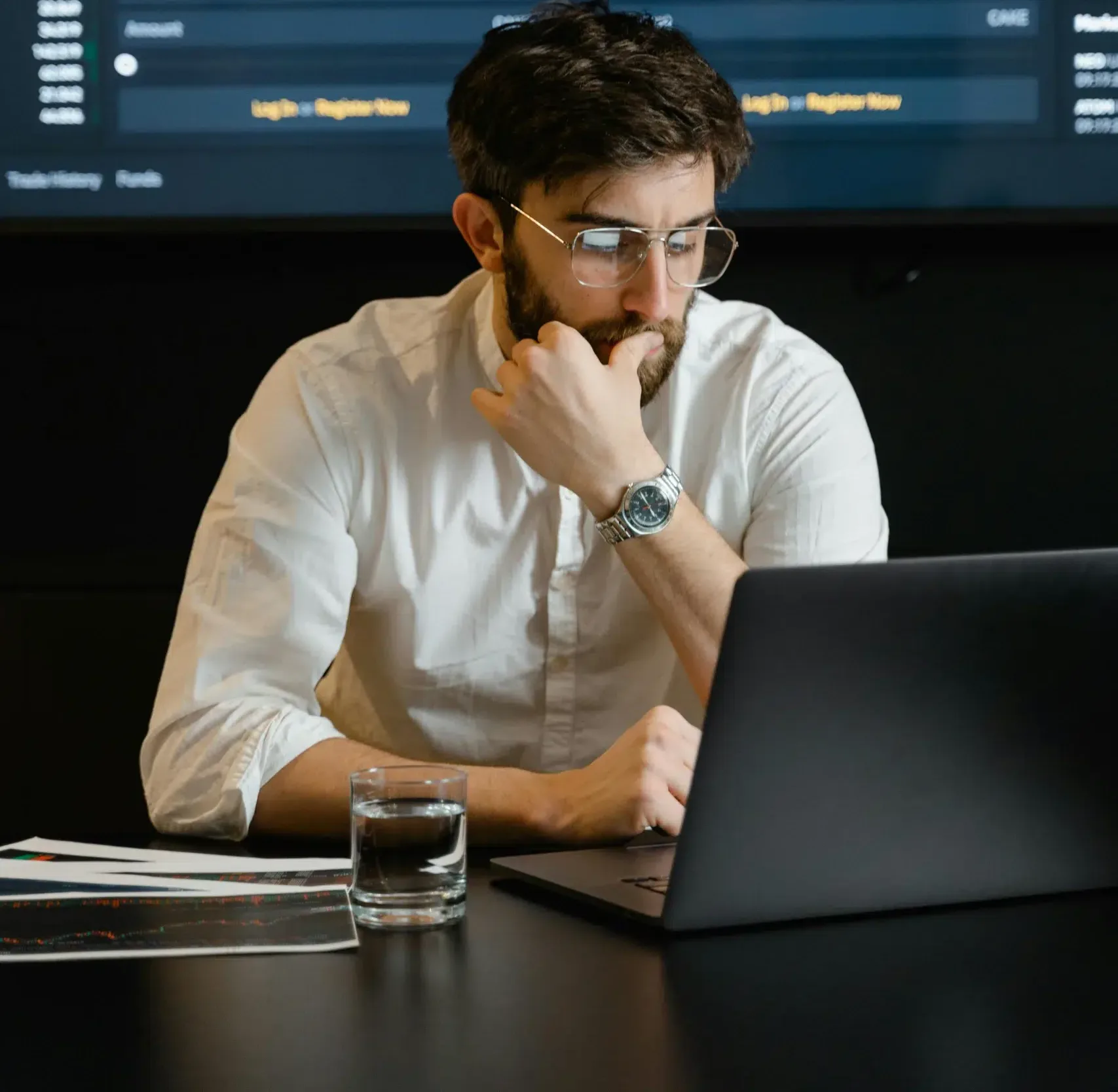 A business man banking online with Community Choice.