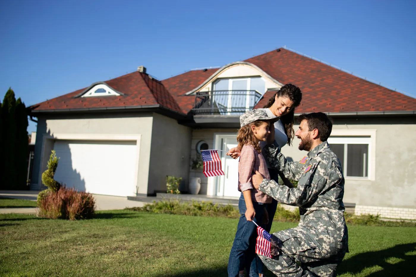A military veteran and his family enjoy their new home thanks to a VA loan through Community Choice Credit Union