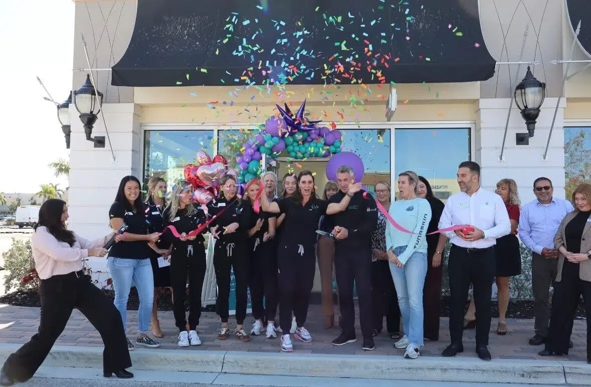 Toros Bardakjian of Community Choice Credit Union celebrates the opening of a local business in Florida.