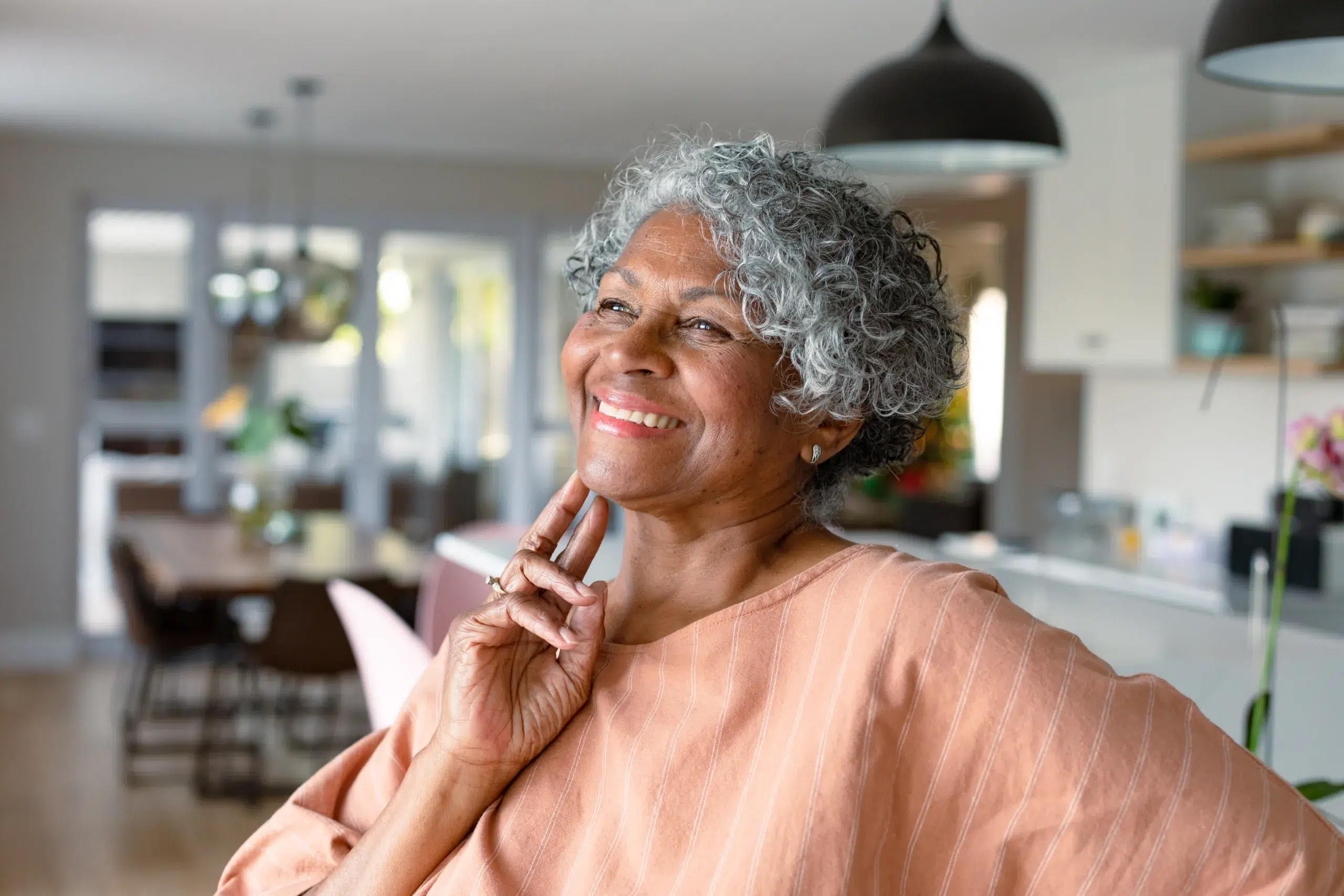 Elderly woman smiling - Community Choice Credit Union